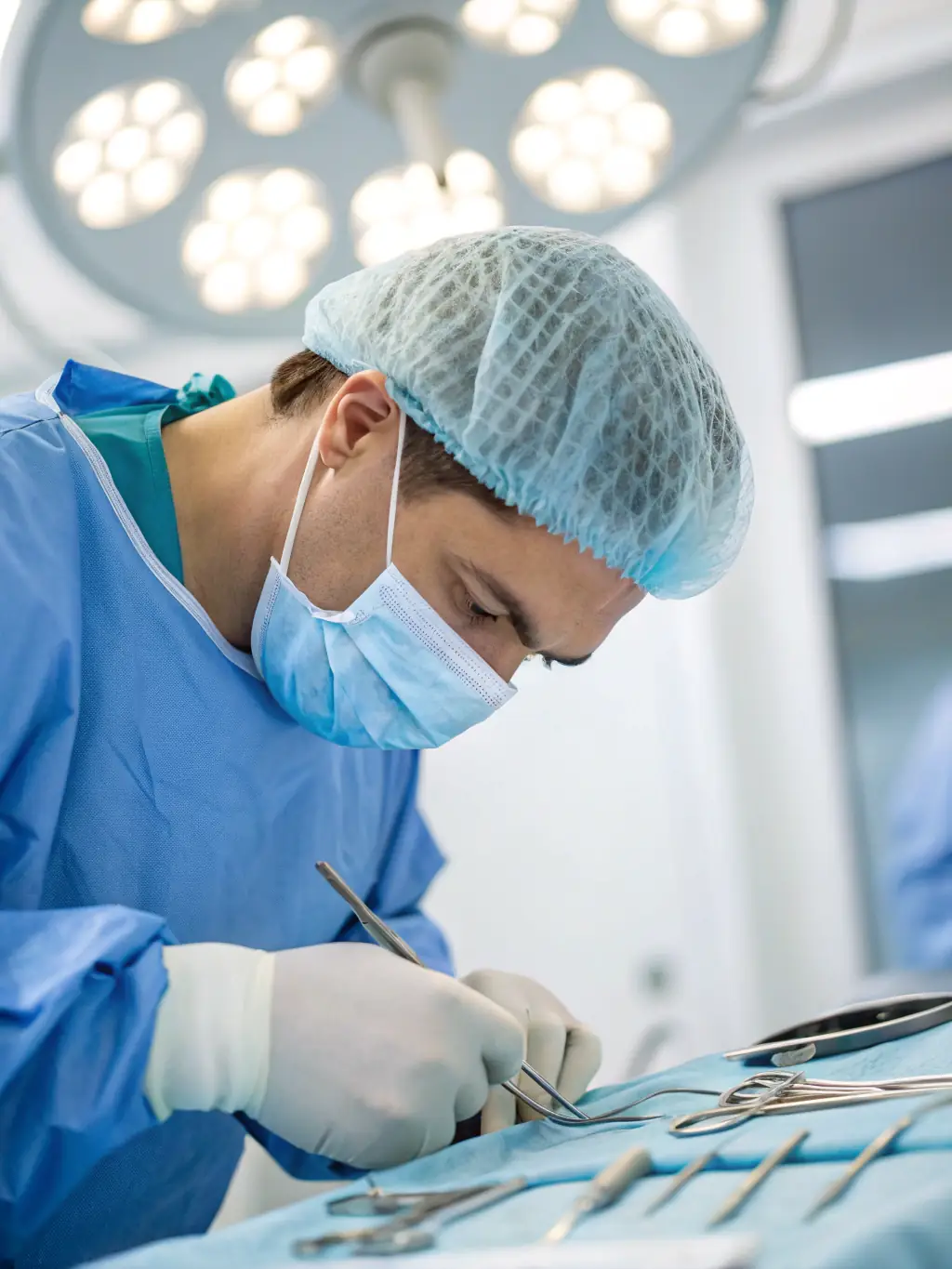 A surgical scene capturing the extraction of hair follicles using the FUE technique, performed by a skilled surgeon at Hair Art Clinics in Uccle.